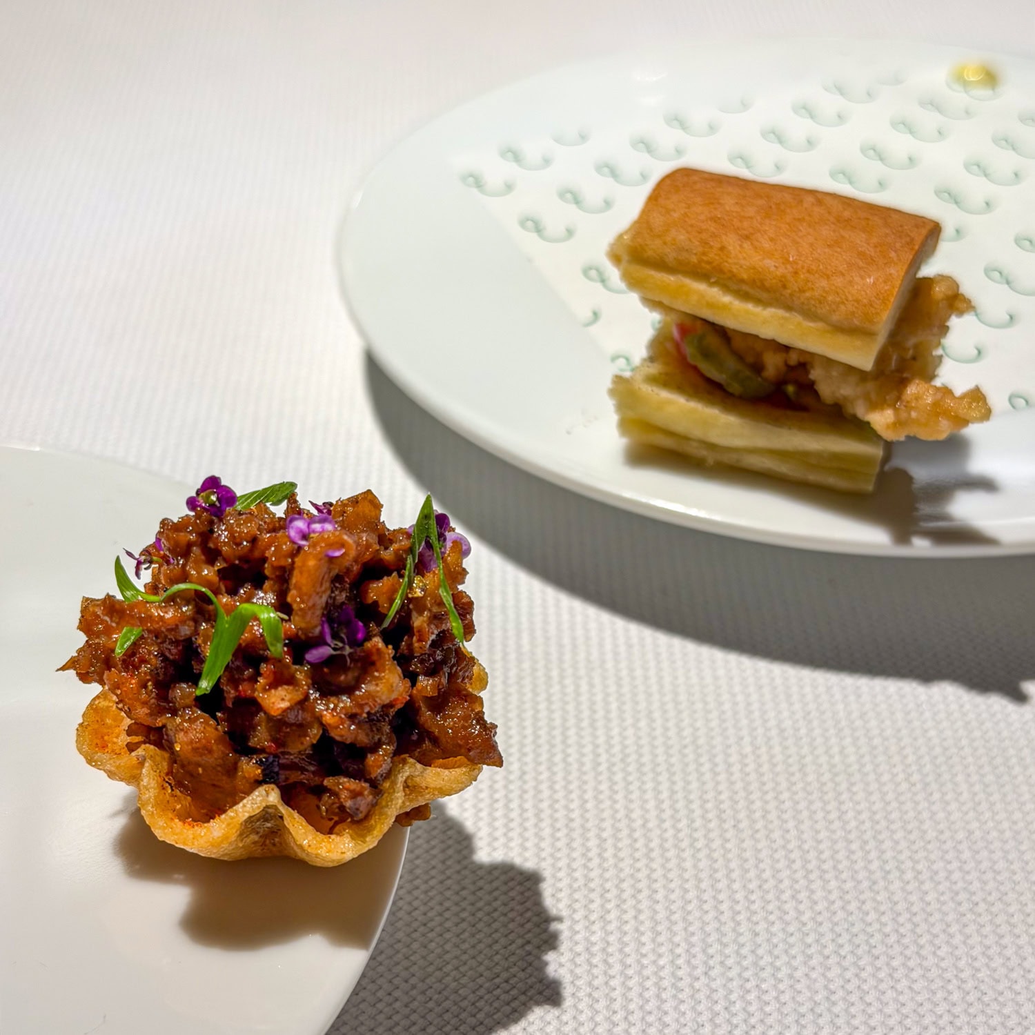 Shrimp tartlet and a BBQ shrimp po'boy.