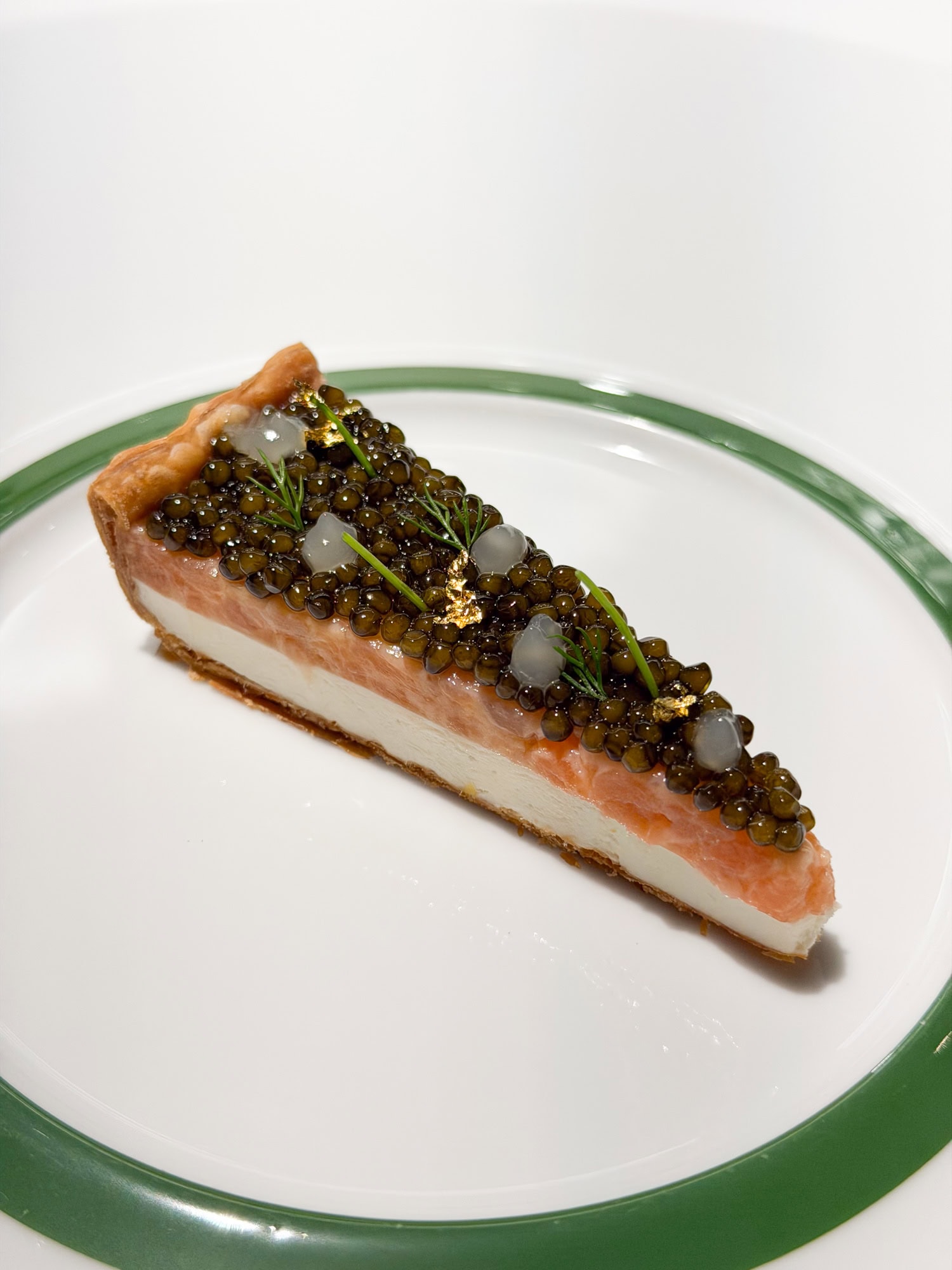 Smoked salmon cheesecake with Petrossian 180-day aged Kaluga caviar at Emeril's restaurant in New Orleans.