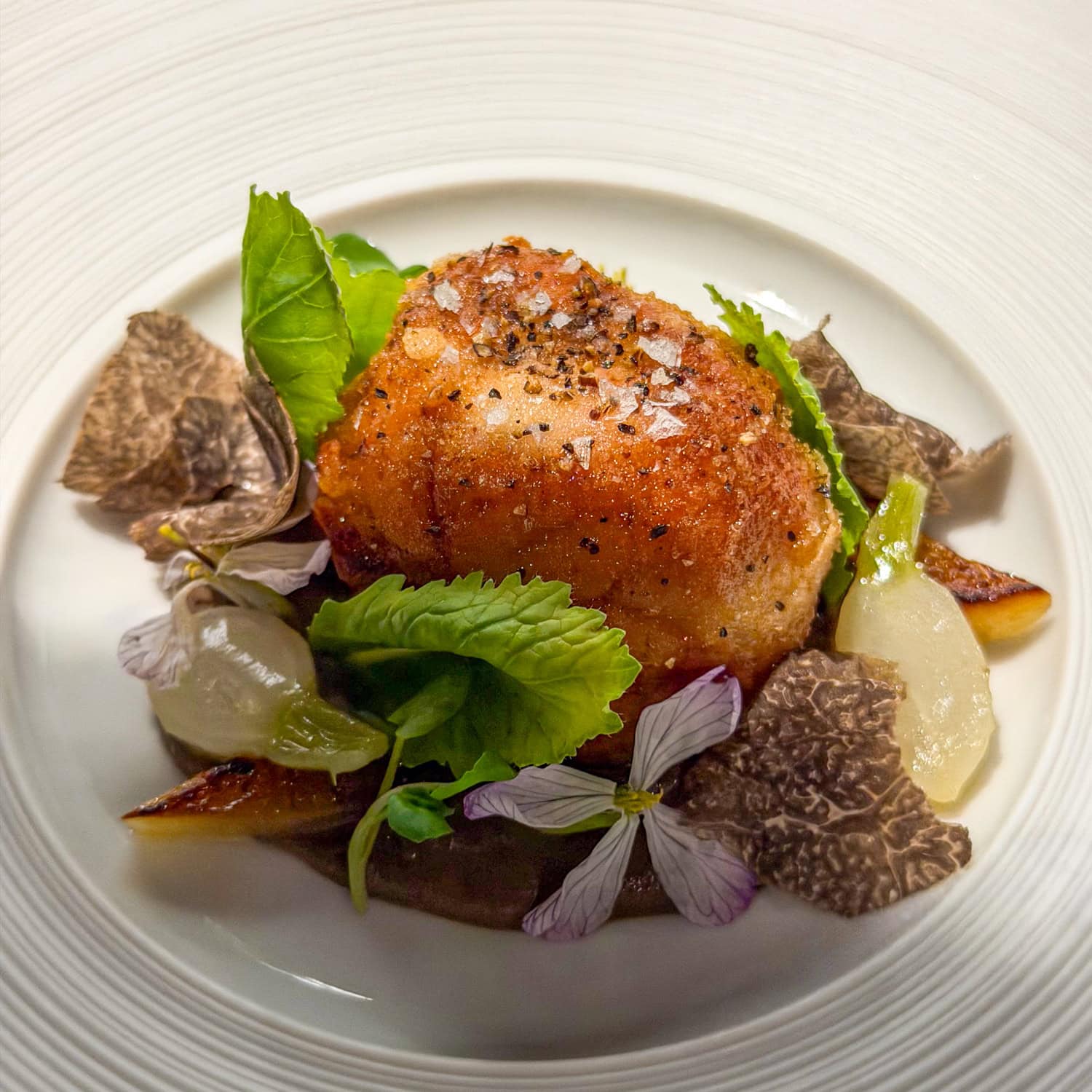 Sweetbread and black truffles (before the sauce and more truffles were added).