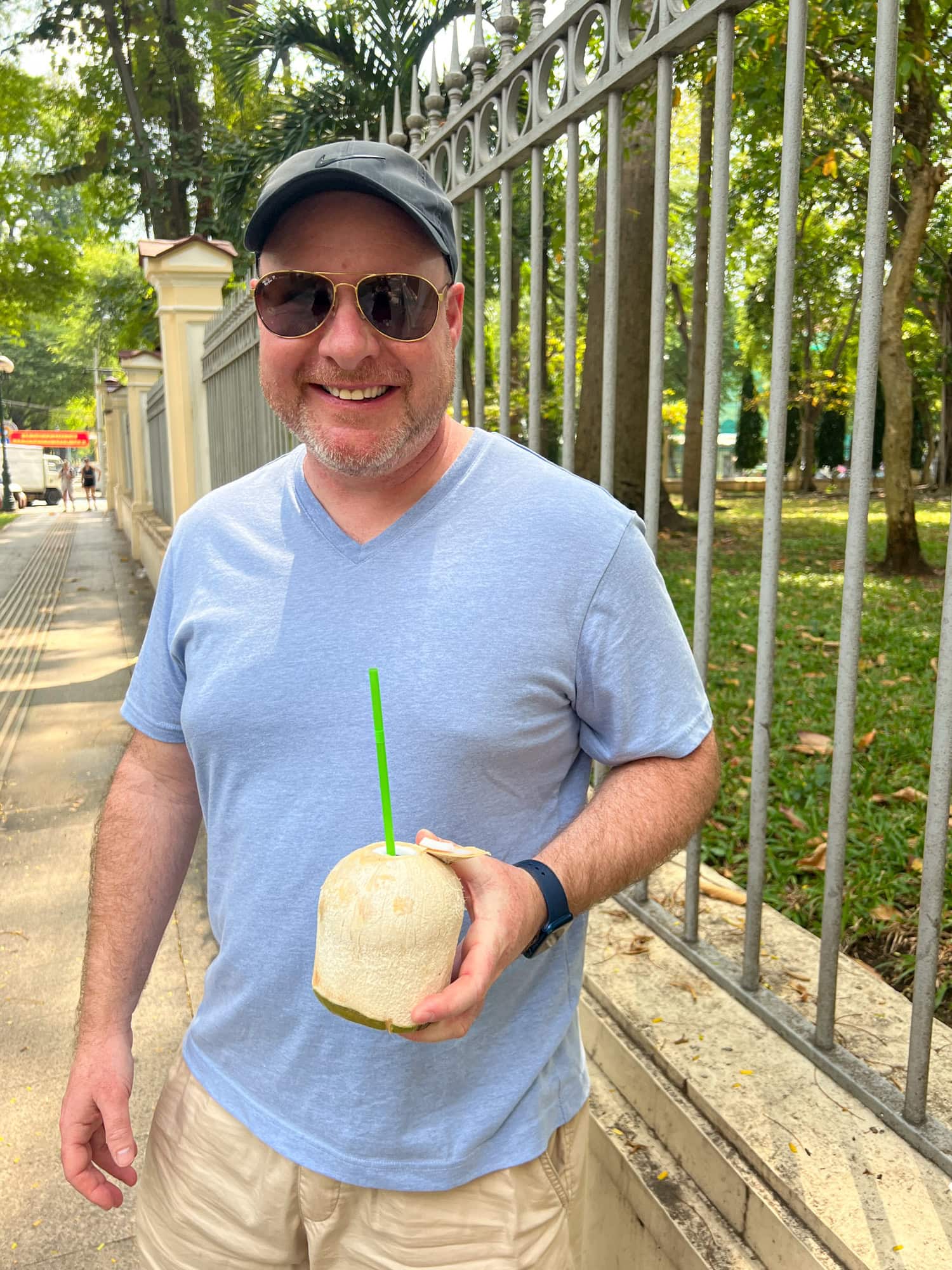 Sipping fresh coconut water on the streets of Saigon.