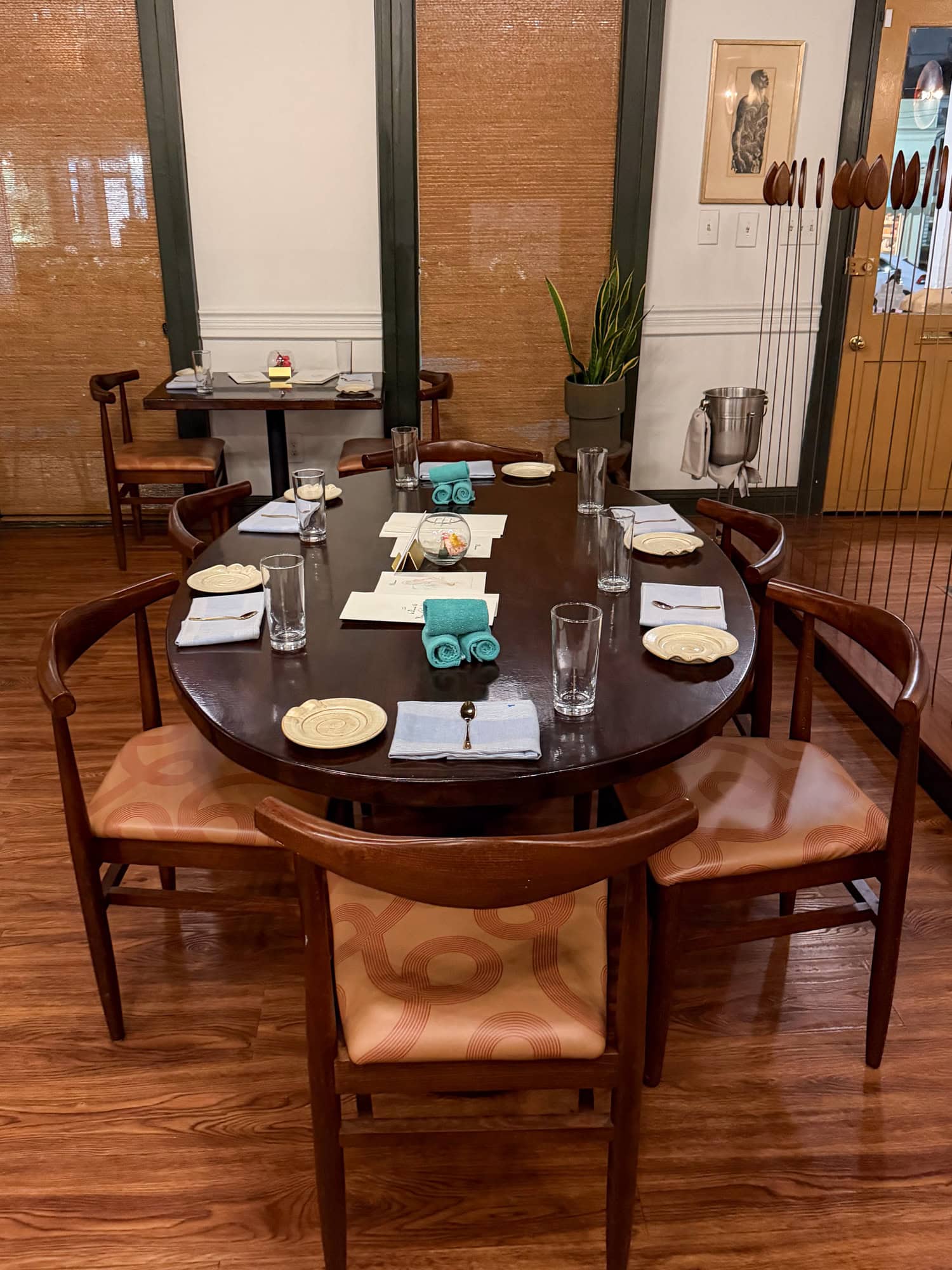 A communal table seats six guests at Dakar NOLA.