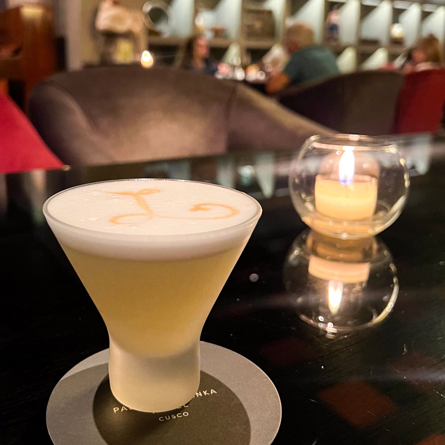 Pisco sour cocktail, Peru's national drink made with pisco and lime.