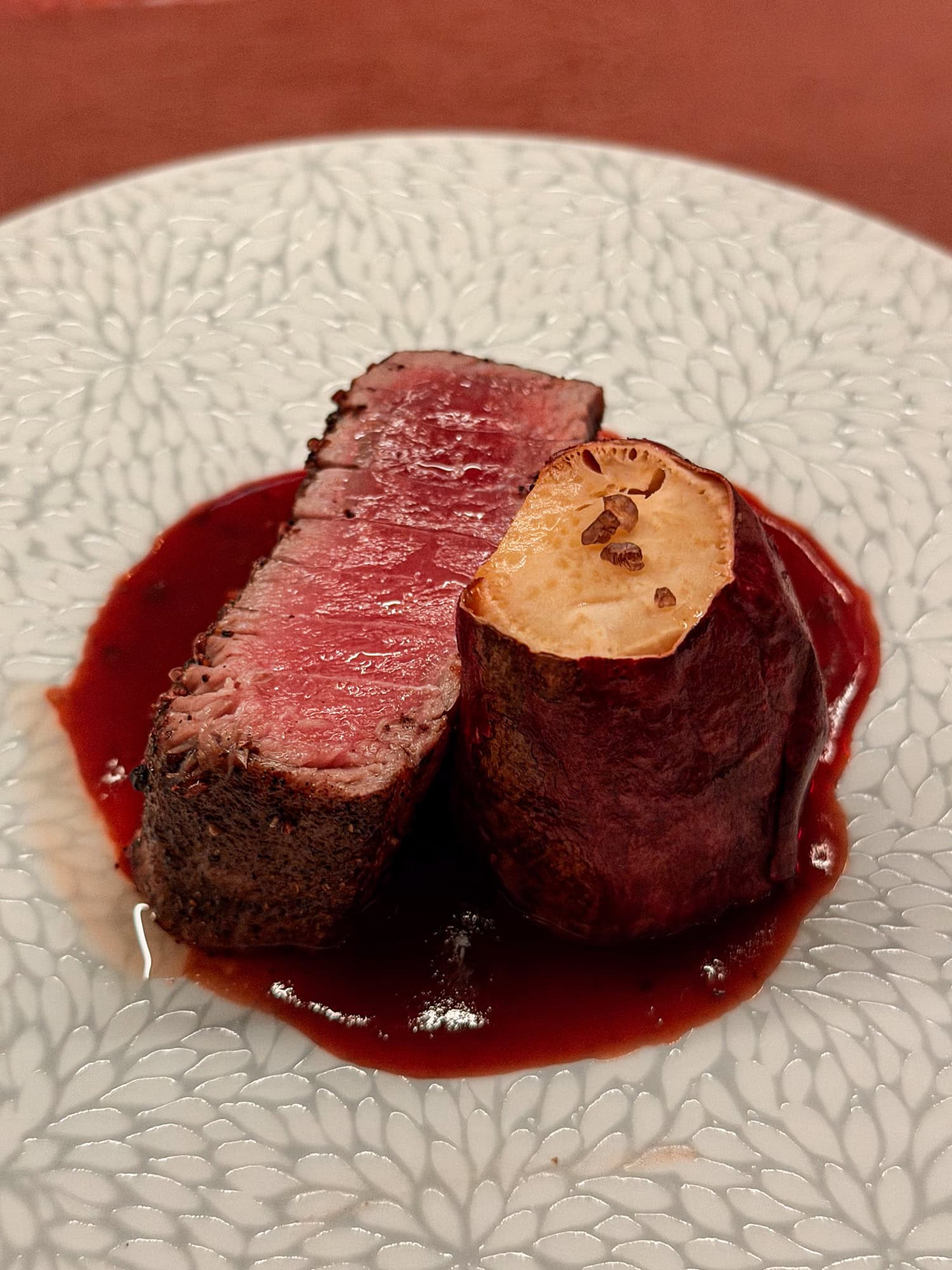 Aged medium tuna served with Japanese sweet potato at Anbā in New York City.