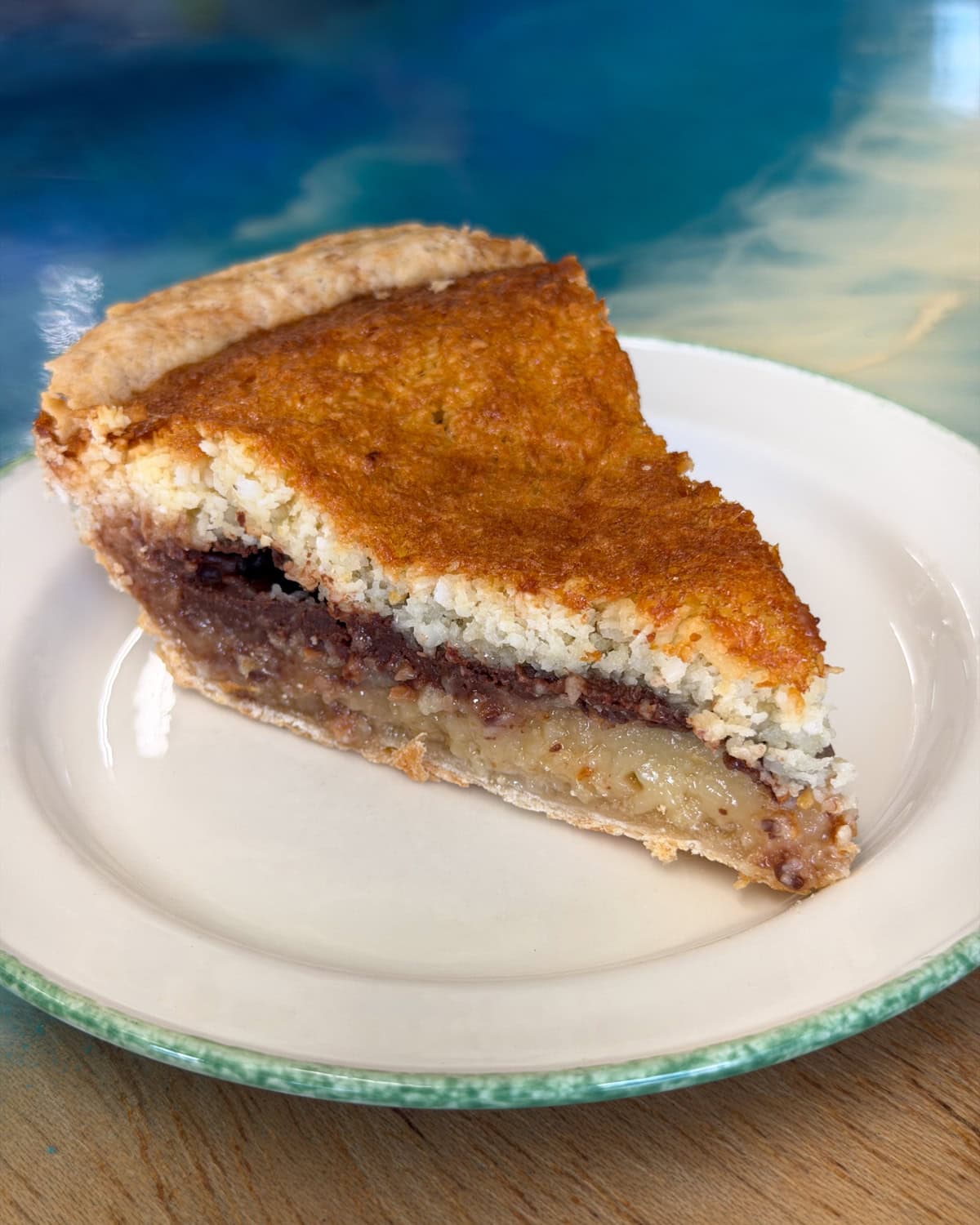 slice of chocolate coconut macaroon pie from The Right Slice in Kalaheo Kauai on plate