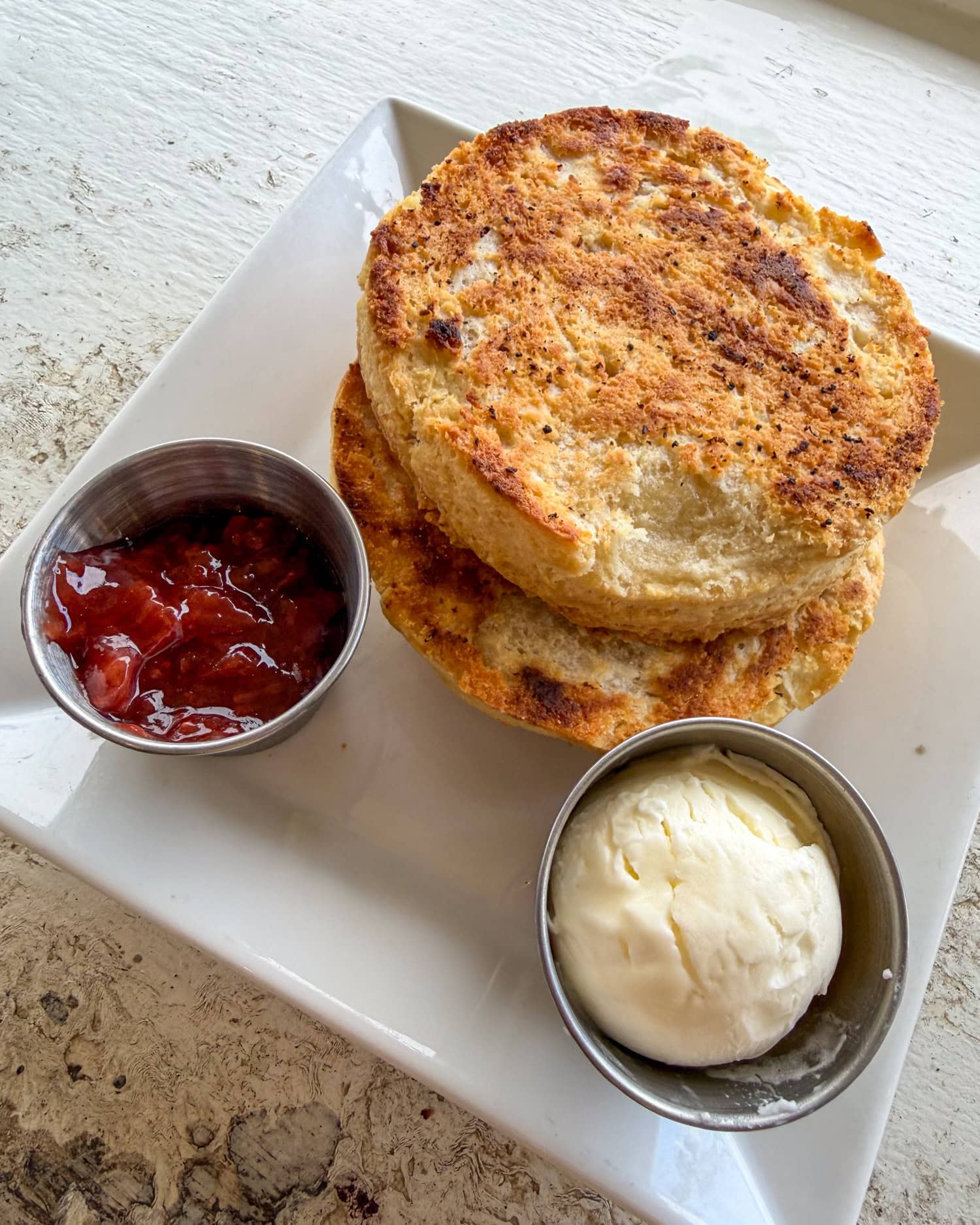 Buttermilk biscuit with butter and jam at Hanalei Bread Company in Hanalei, Kauai.