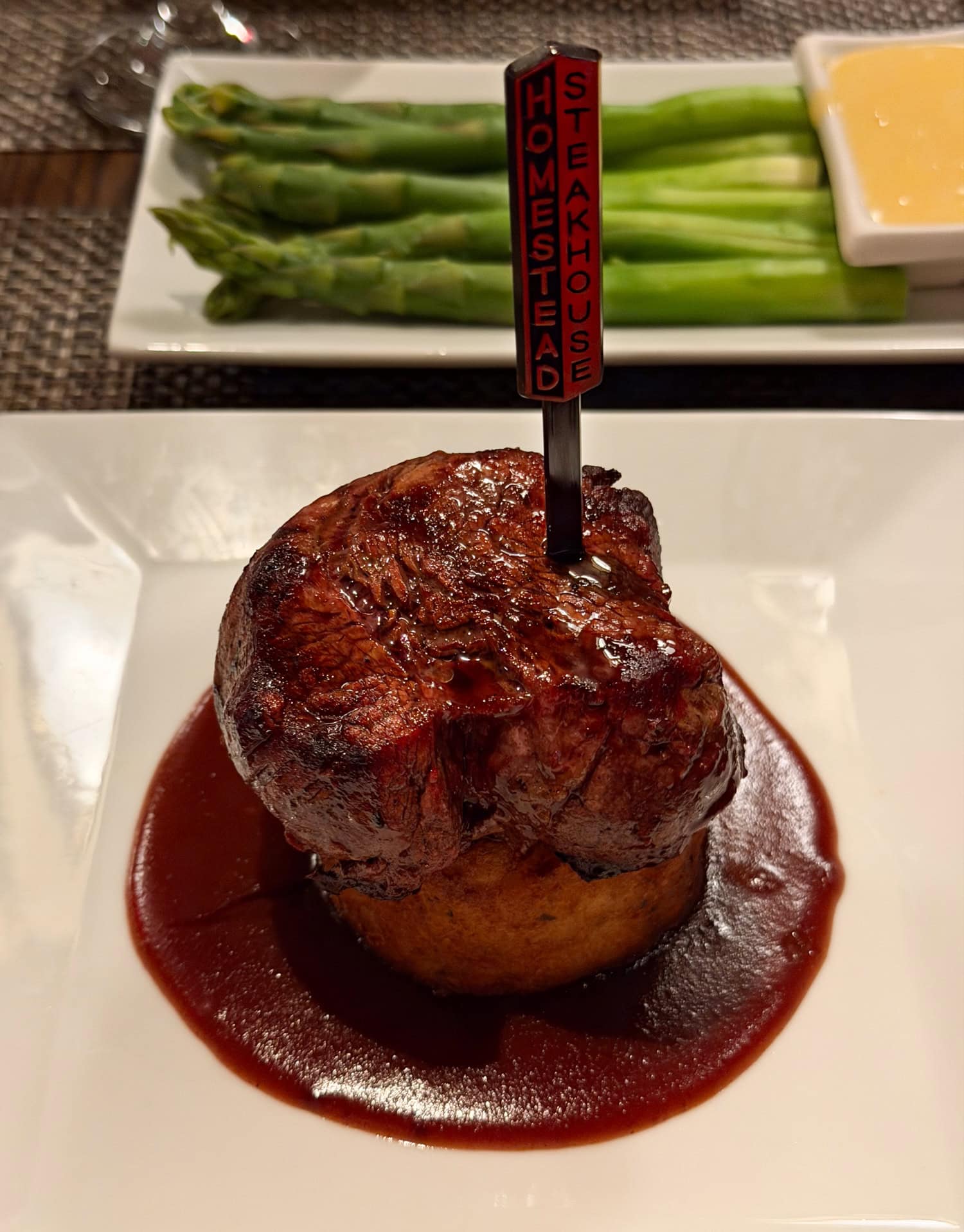 Filet mignon with steak sauce at Old Homestead Steakhouse in New York City.