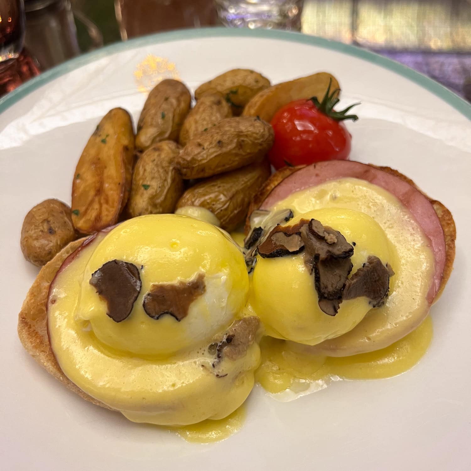 The Plaza Signature Eggs Benedict with black truffle at The Palm Court, a classic NYC restaurant
