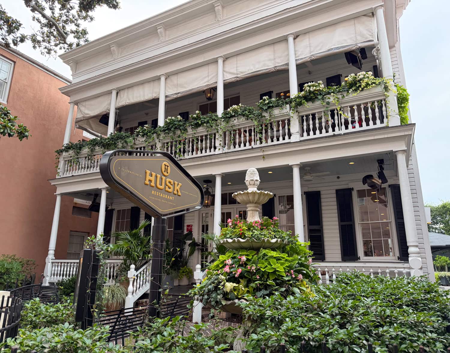 Exterior of Husk restaurant inside a historic Victorian home in Charleston