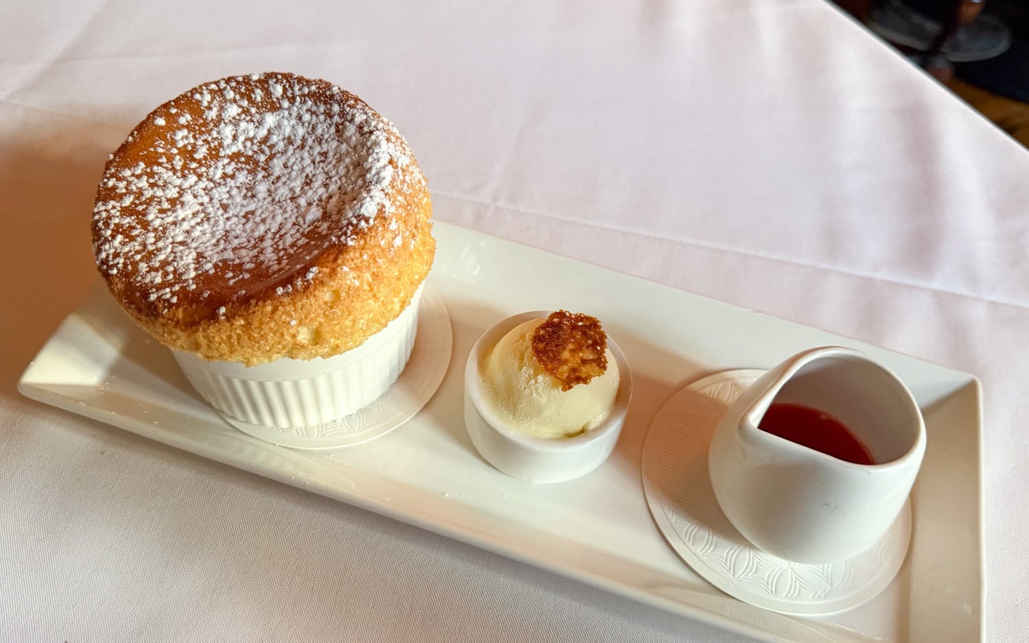 Vanilla soufflé with vanilla bean ice cream and berry sauce at Circa 1886 Restaurant in Charleston, South Carolina.