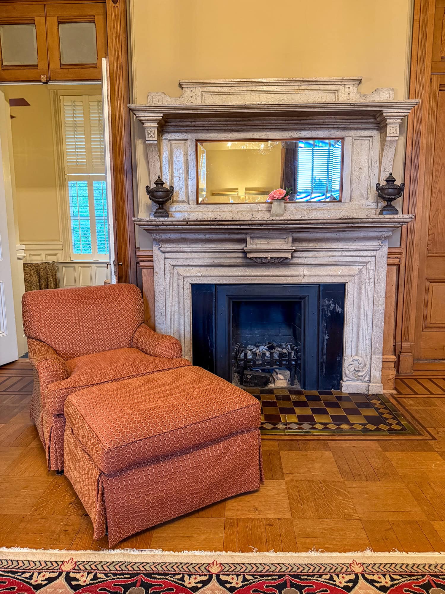 Original marble fireplace in Suite Nine