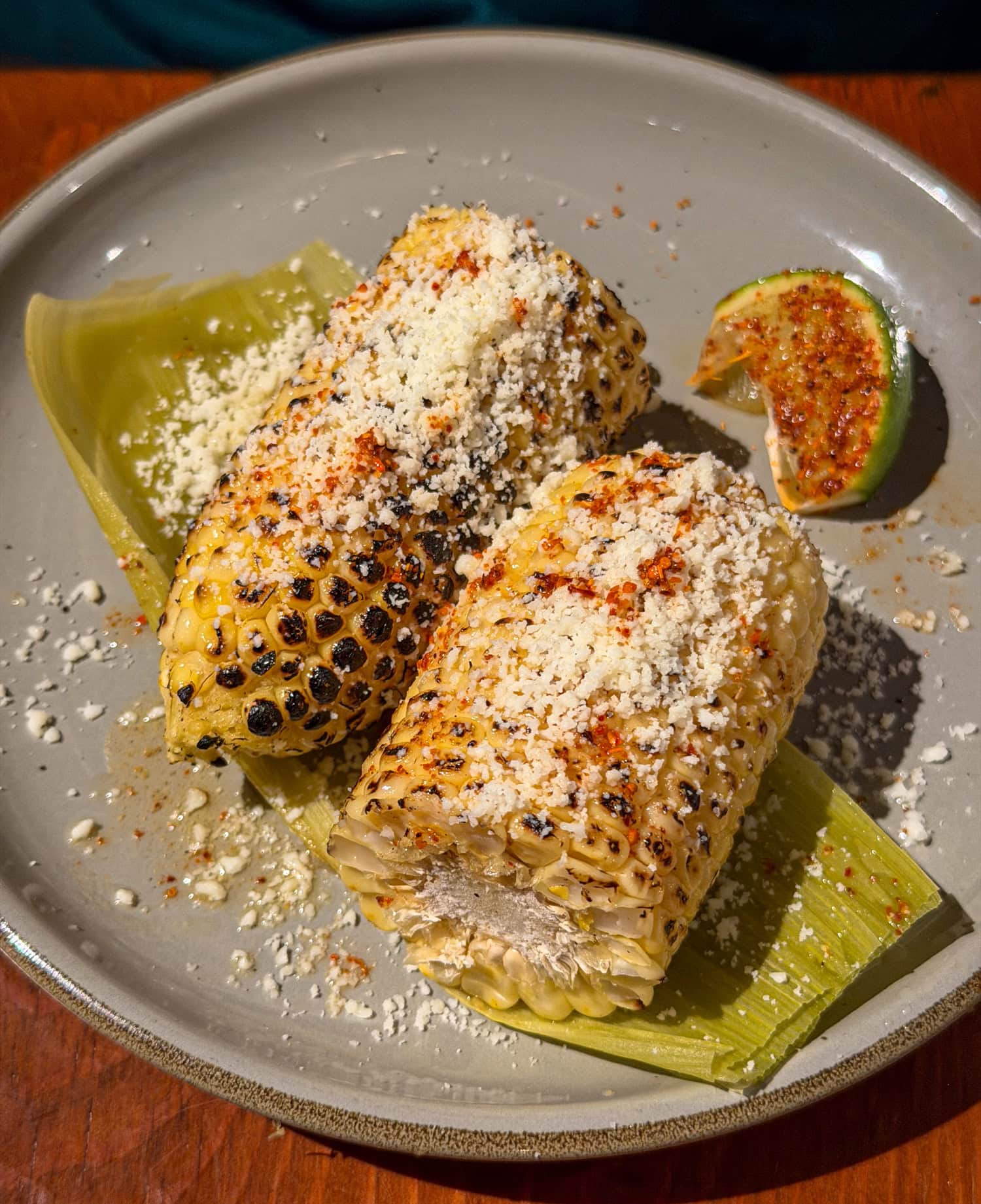 Grilled corn on the cob with chili-lime butter and cotija cheese at Colibri Mexican Bistro