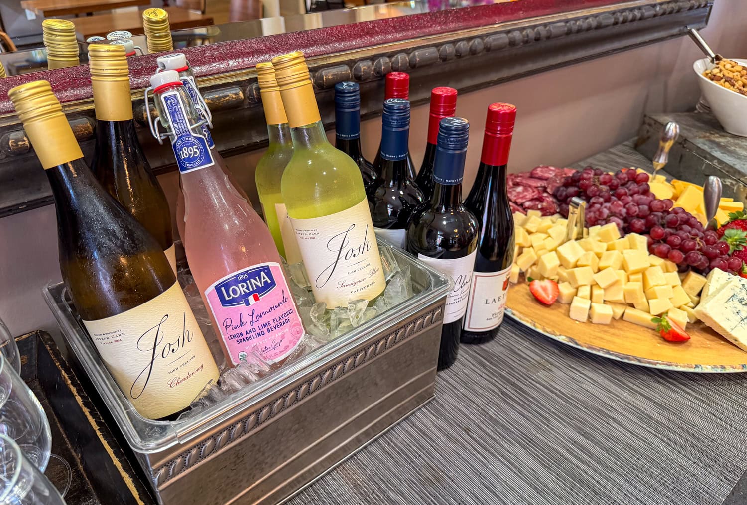 Wine bottles and a cheese board at the Inn at the Presidio's evening reception