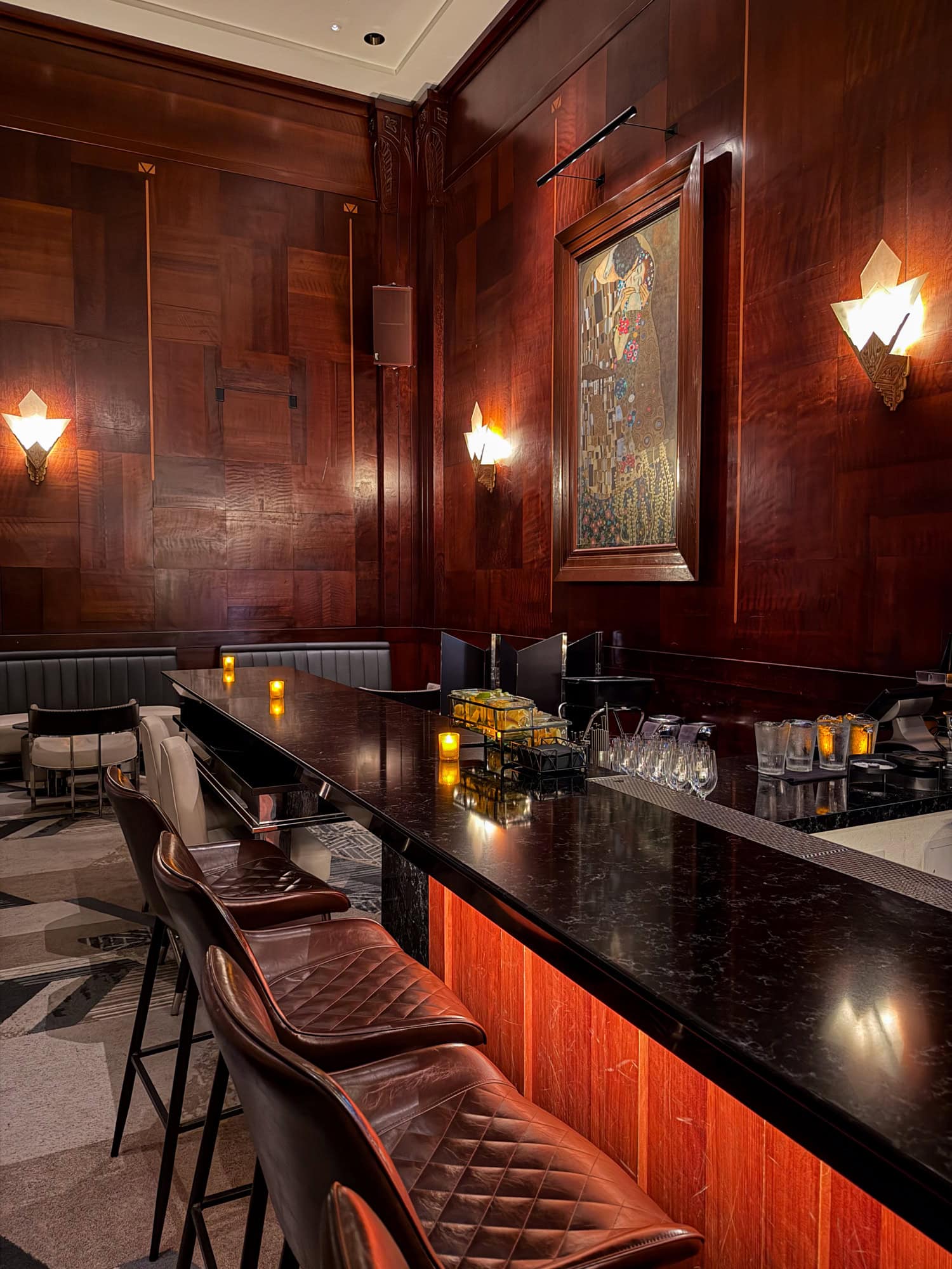 Marble bar and original artwork inside the Redwood Room at The Clift Royal Sonesta Hotel