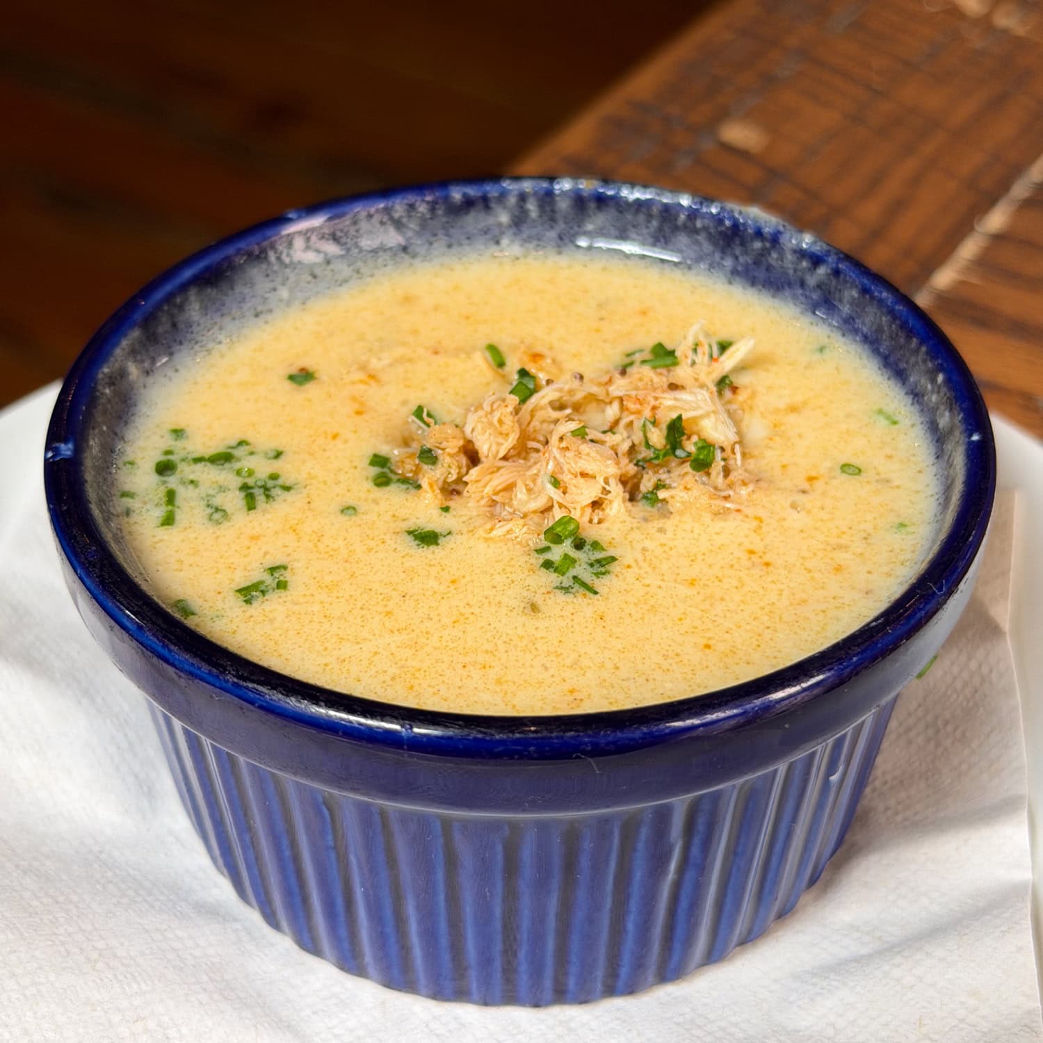 A cup of she-crab soup topped with chives at Poogan's Porch