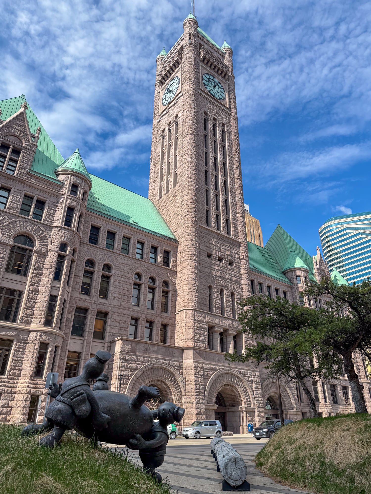 Playful sculptures in Federal Courthouse Plaza with Minneapolis City Hall behind them