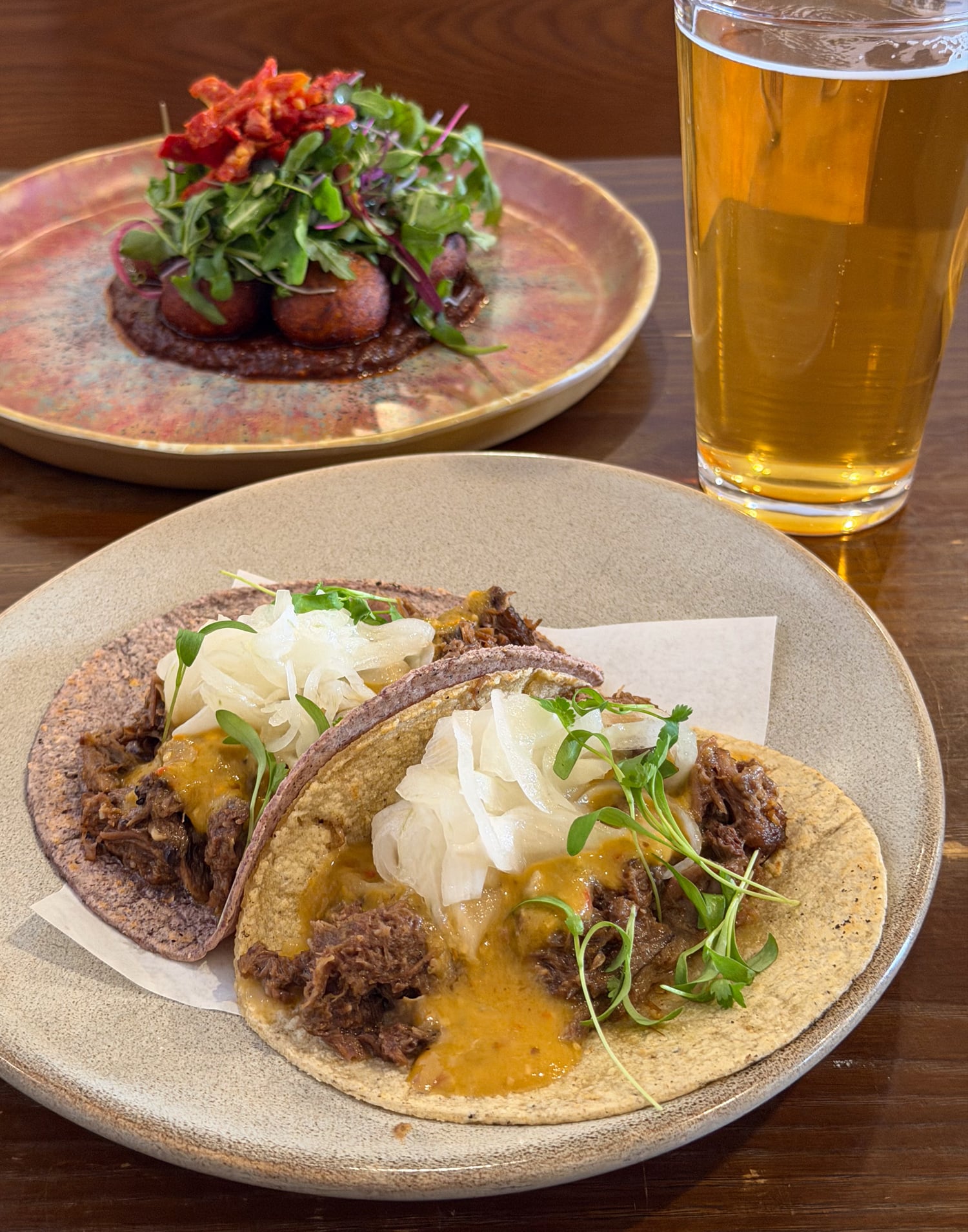 Beef tongue tacos with chile de árbol salsa and cured onions at Oro by Nixta in Minneapolis