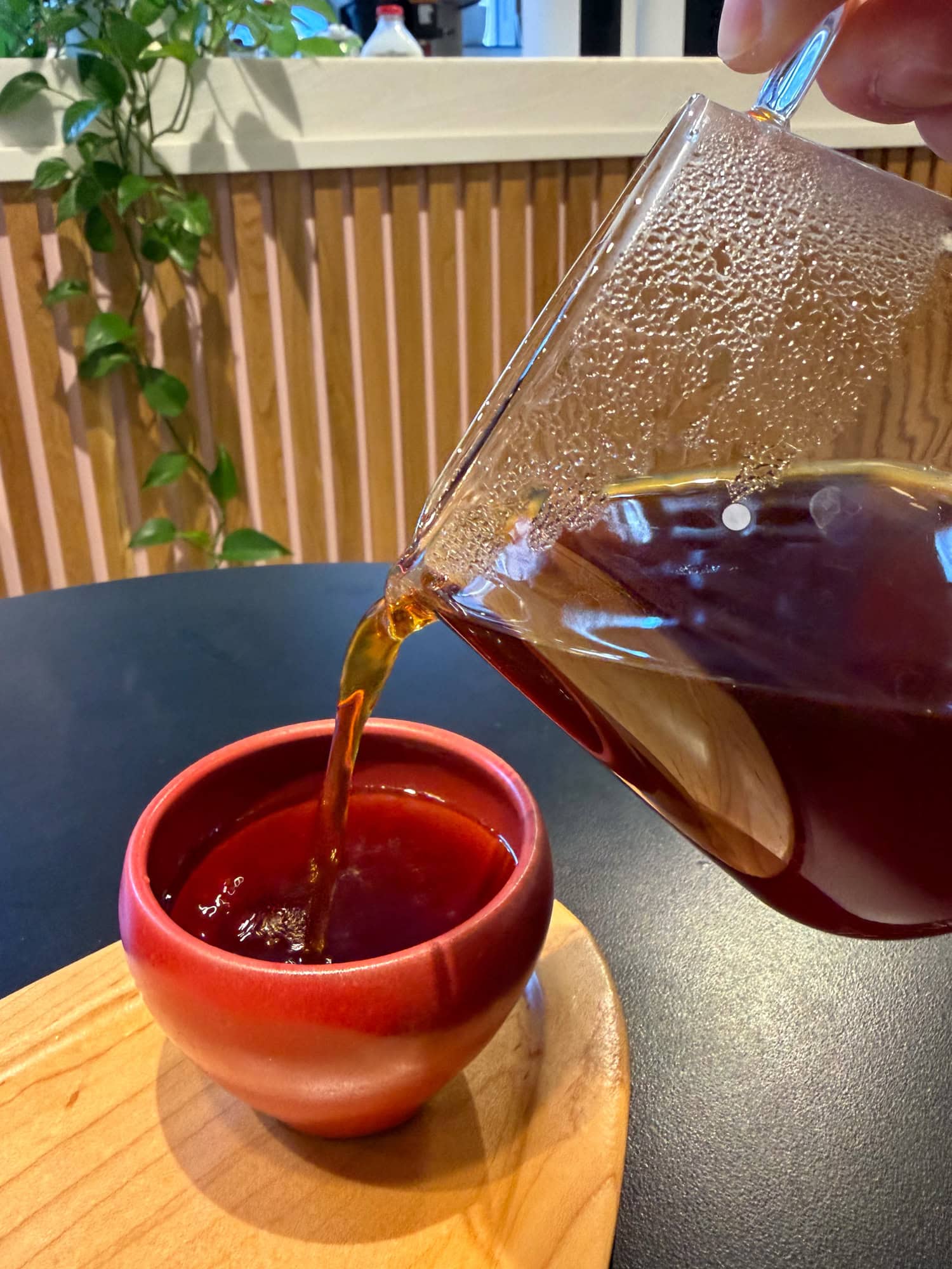 Pouring Yessica Parra Papayo coffee from Colombia at SK Coffee in Minneapolis