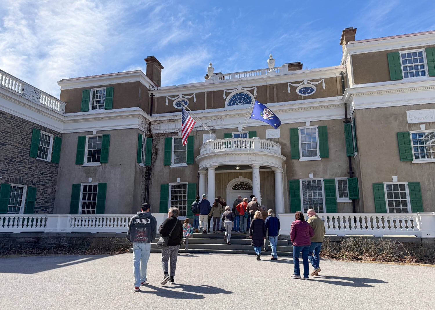Visitors walking toward the entrance of Springwood, Franklin D. Roosevelt's home in Hyde Park, New York.