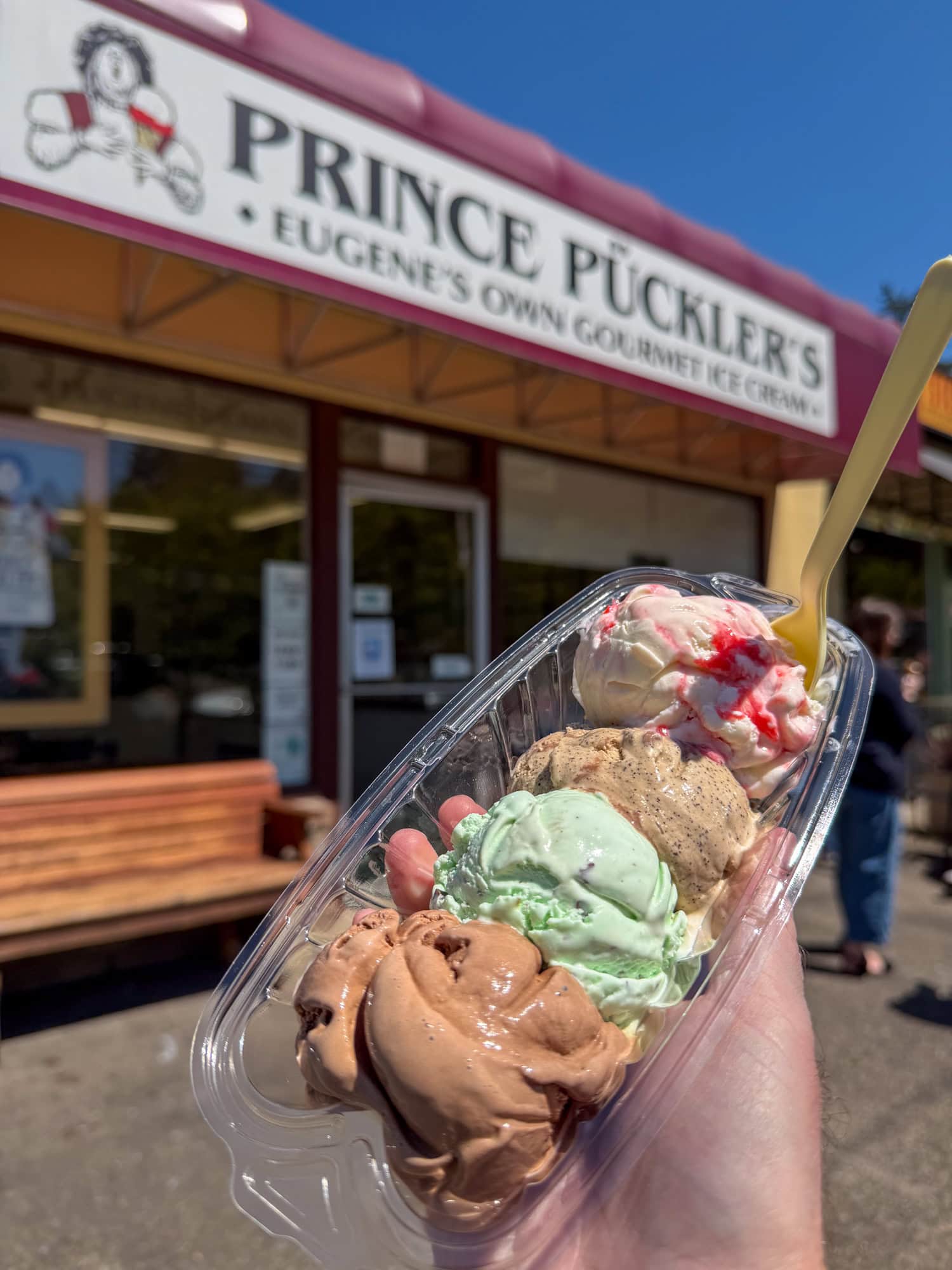Four-flavor ice cream sampler held outside Prince Puckler's in Eugene, Oregon.